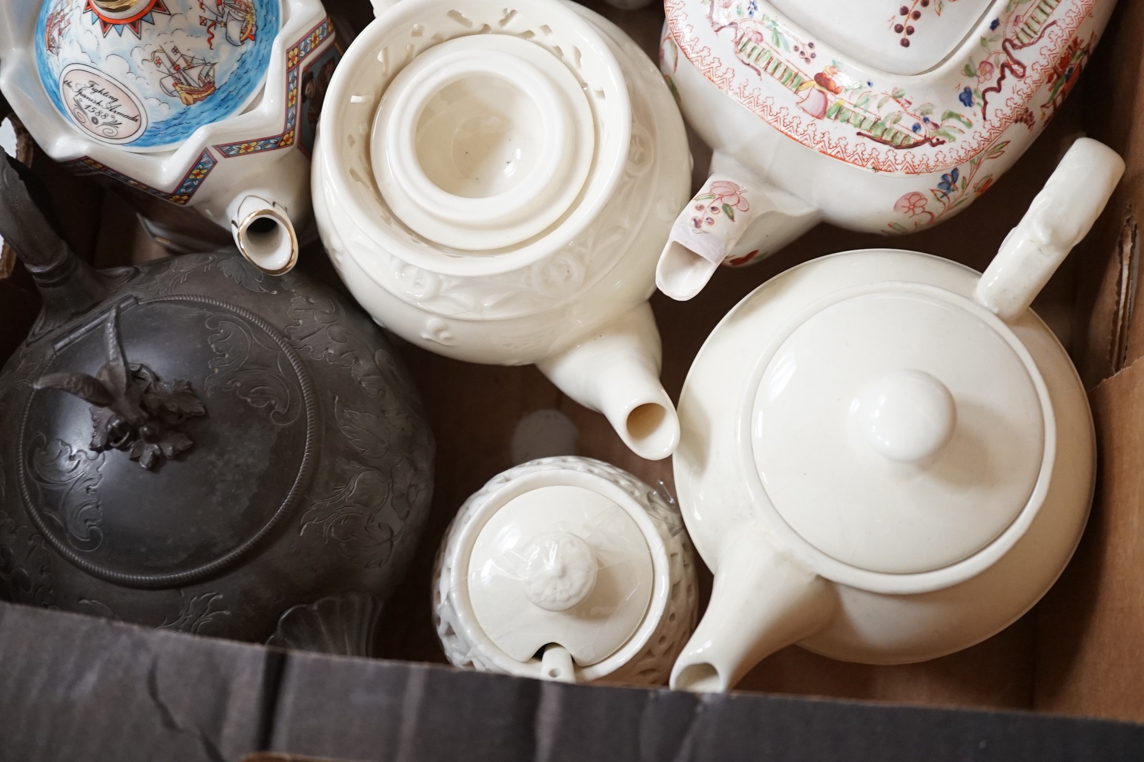 A quantity of various teapots including Doulton, Sadler etc.